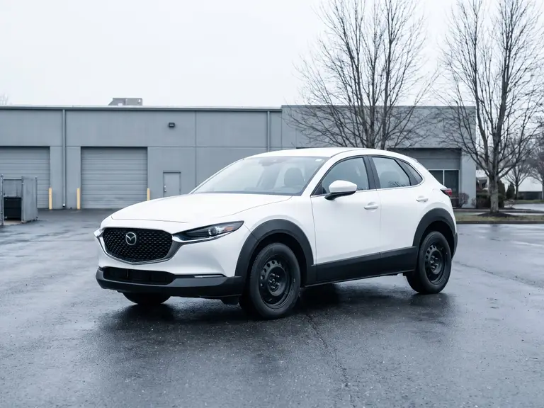 Compact crossover SUV in fleet specification on a depot apron